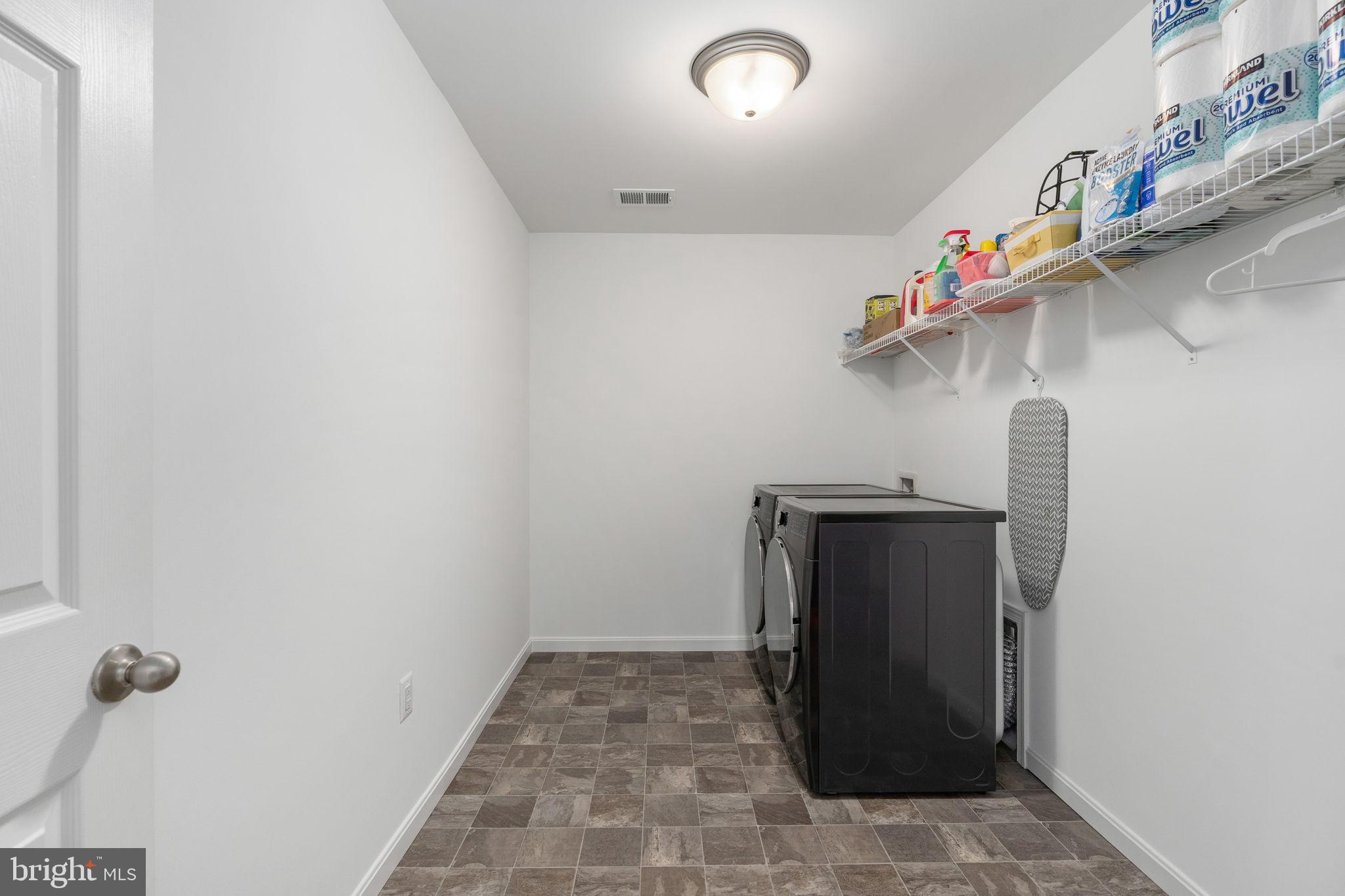 6371 Pointer Lane King George, VA 22485 - Photo 28 of 51 Bright & functional laundry room with extra space.