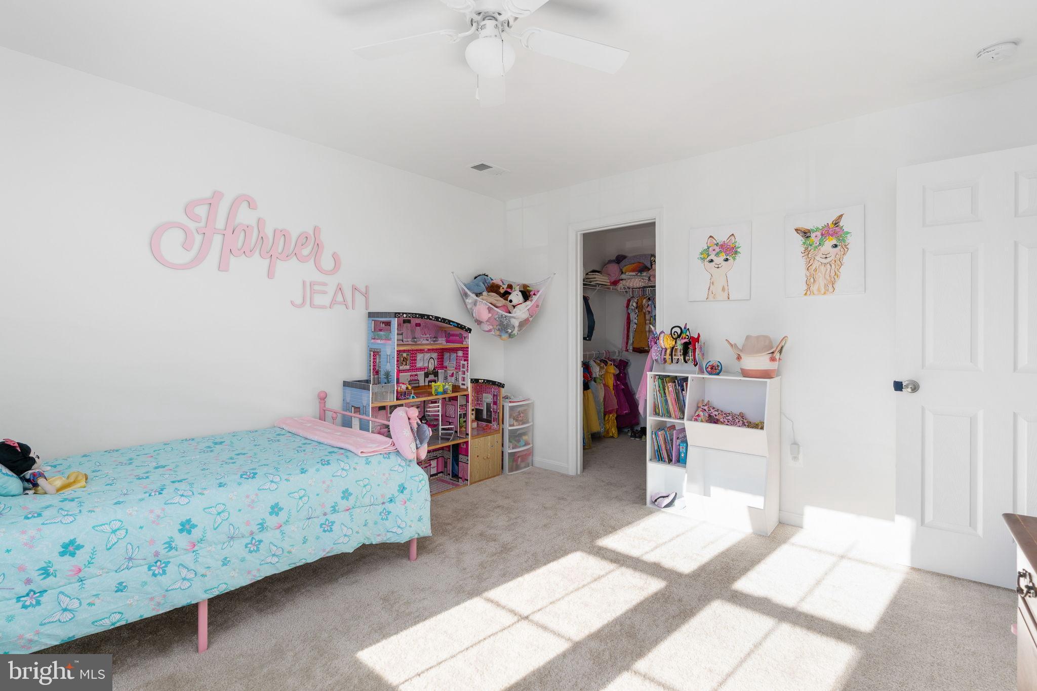 6371 Pointer Lane King George, VA 22485 - Photo 29 of 51 Bright and cheerful bedroom with a walk-in closet.