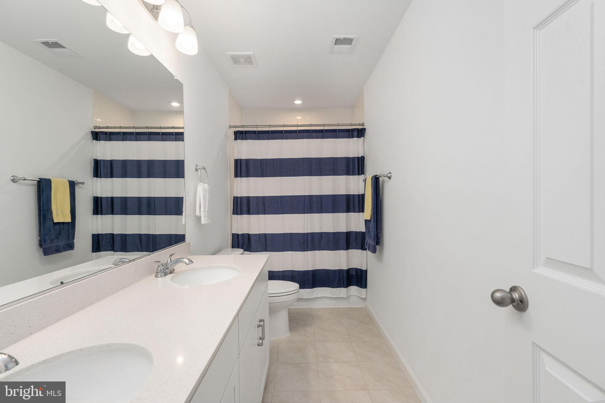 6371 Pointer Lane King George, VA 22485 - Photo 35 of 51 Great hall bath with double sinks, quartz top.
