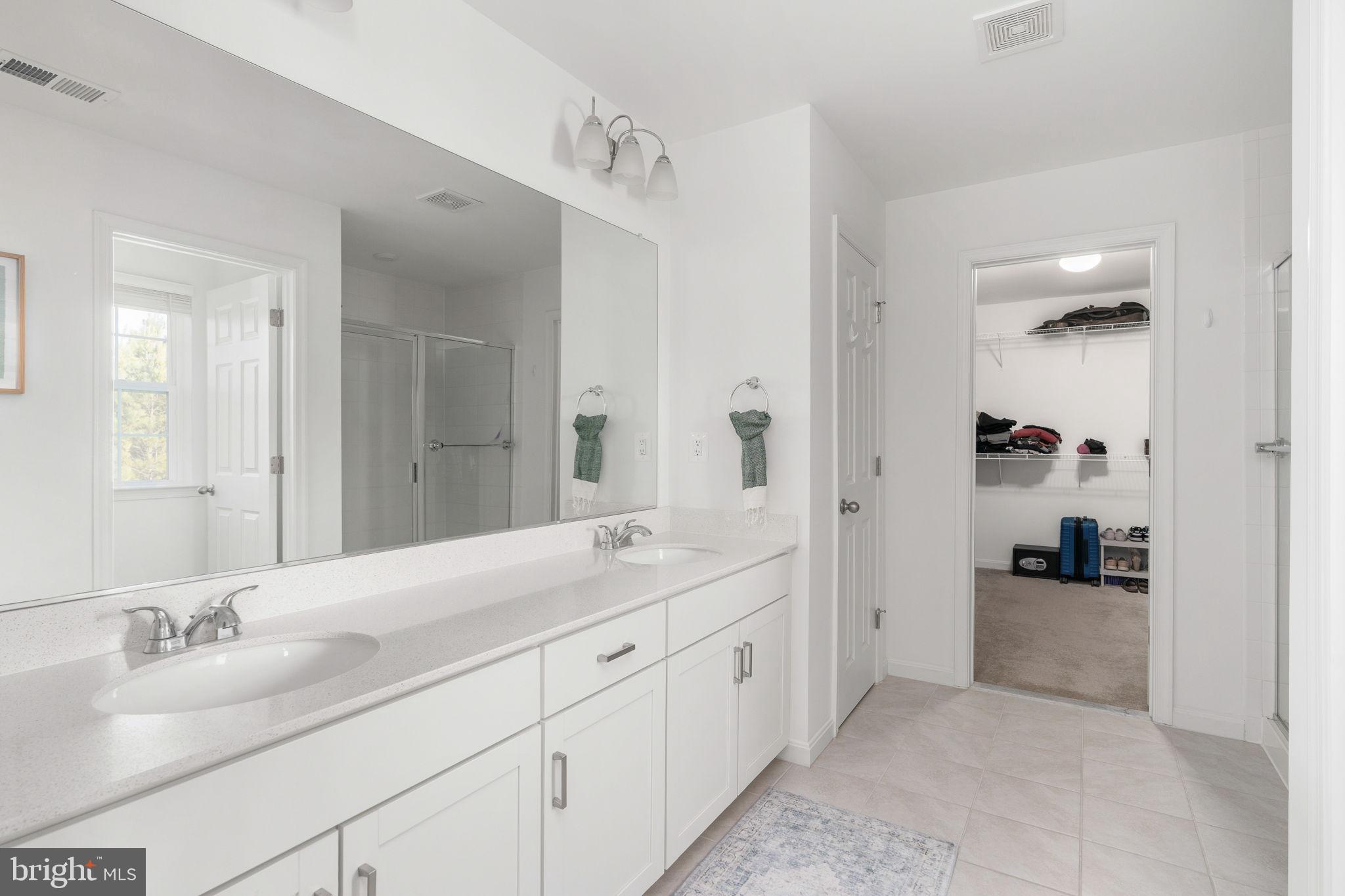 6371 Pointer Lane King George, VA 22485 - Photo 41 of 51 Dual sinks and huge walk-in closet.