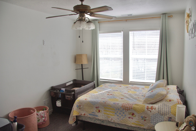 327 West Main Street, Unit 14 Santaquin, UT 84655 - Photo 13 of 20 Bedroom with a ceiling fan