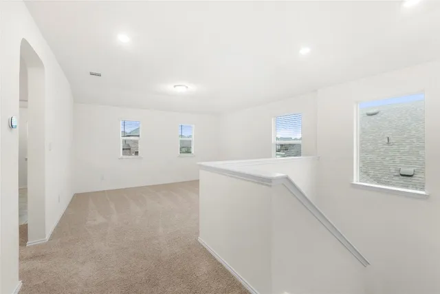 an empty room with windows