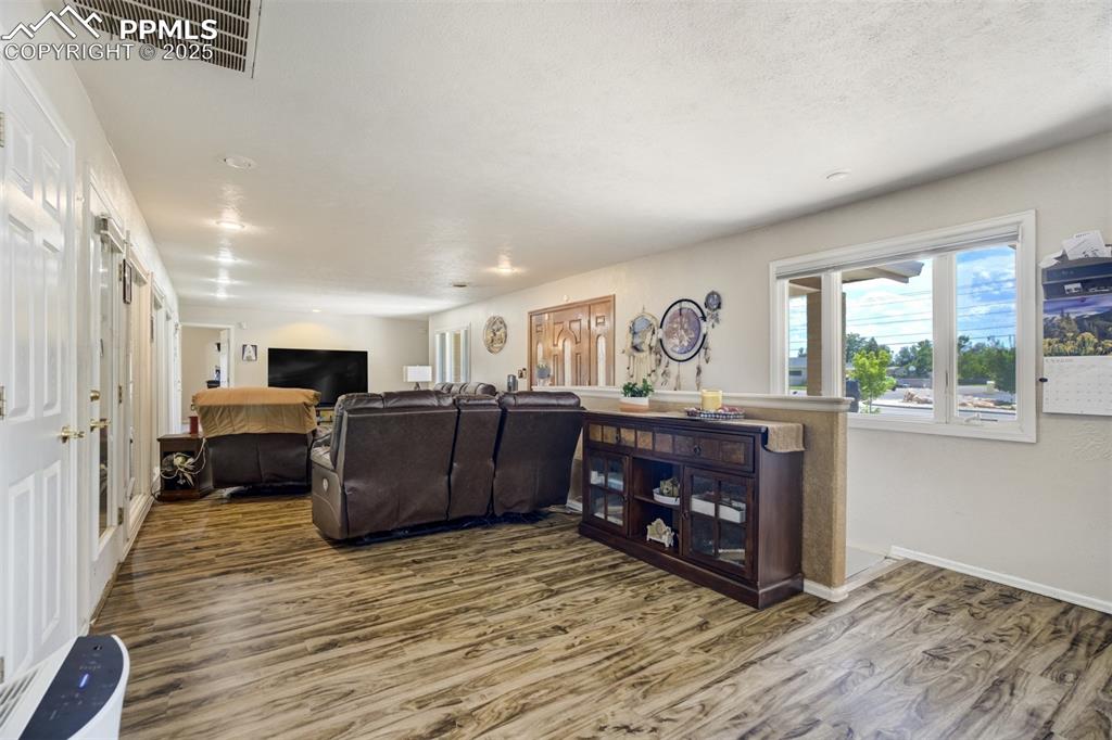 27875 County Farm Road Pueblo, CO 81006 - Photo 9 of 50 a living room with furniture and a fireplace