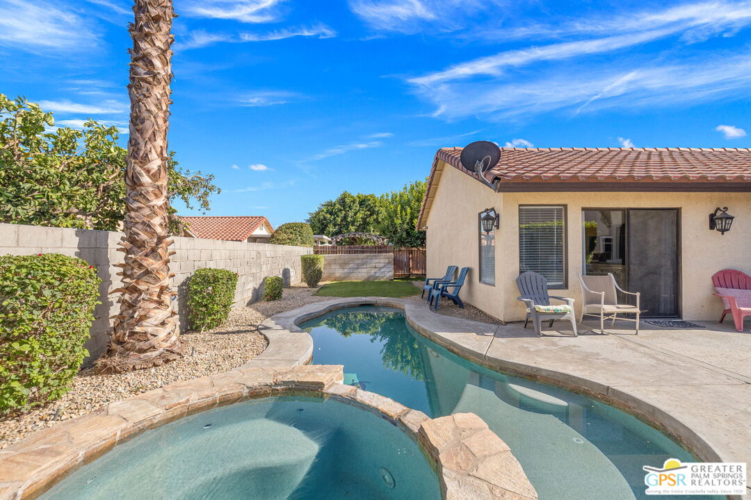 45688 Sutter Creek Road Indio, CA 92201 - Photo 46 of 51 a view of a house with backyard porch and sitting area