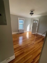113 Rockland Street, Unit 2 Canton, MA 02021 - Photo 15 of 22 a view of empty room with wooden floor