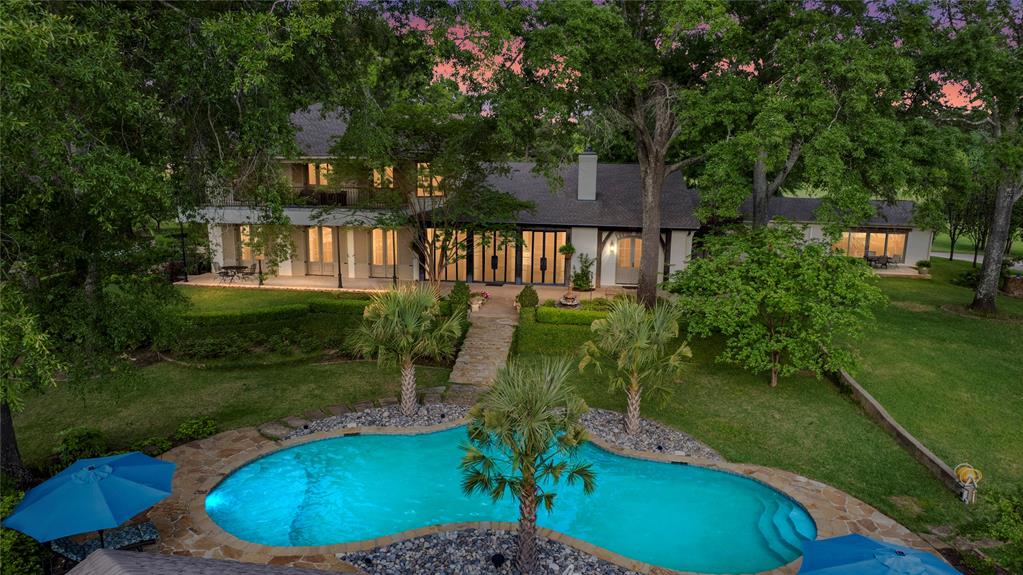 3920 Smelley Road Longview, TX 75605 - Photo 26 of 35 a view of a backyard with a garden