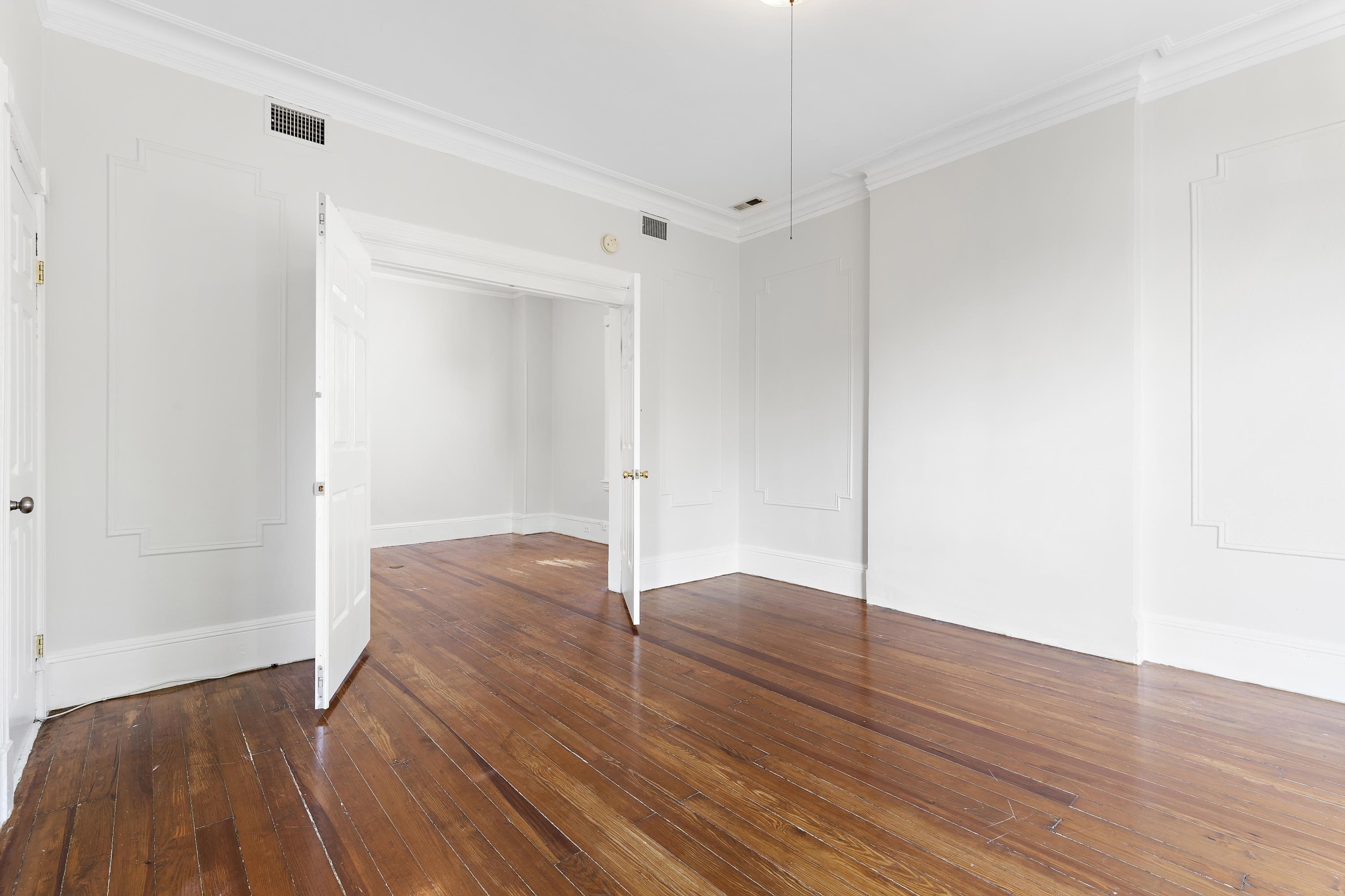 11 Hudson Place, Unit 2 Weehawken, NJ 07086 - Photo 11 of 16 a view of empty room with wooden floor