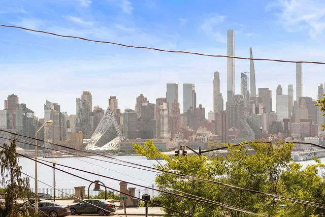 a view of a city with tall buildings