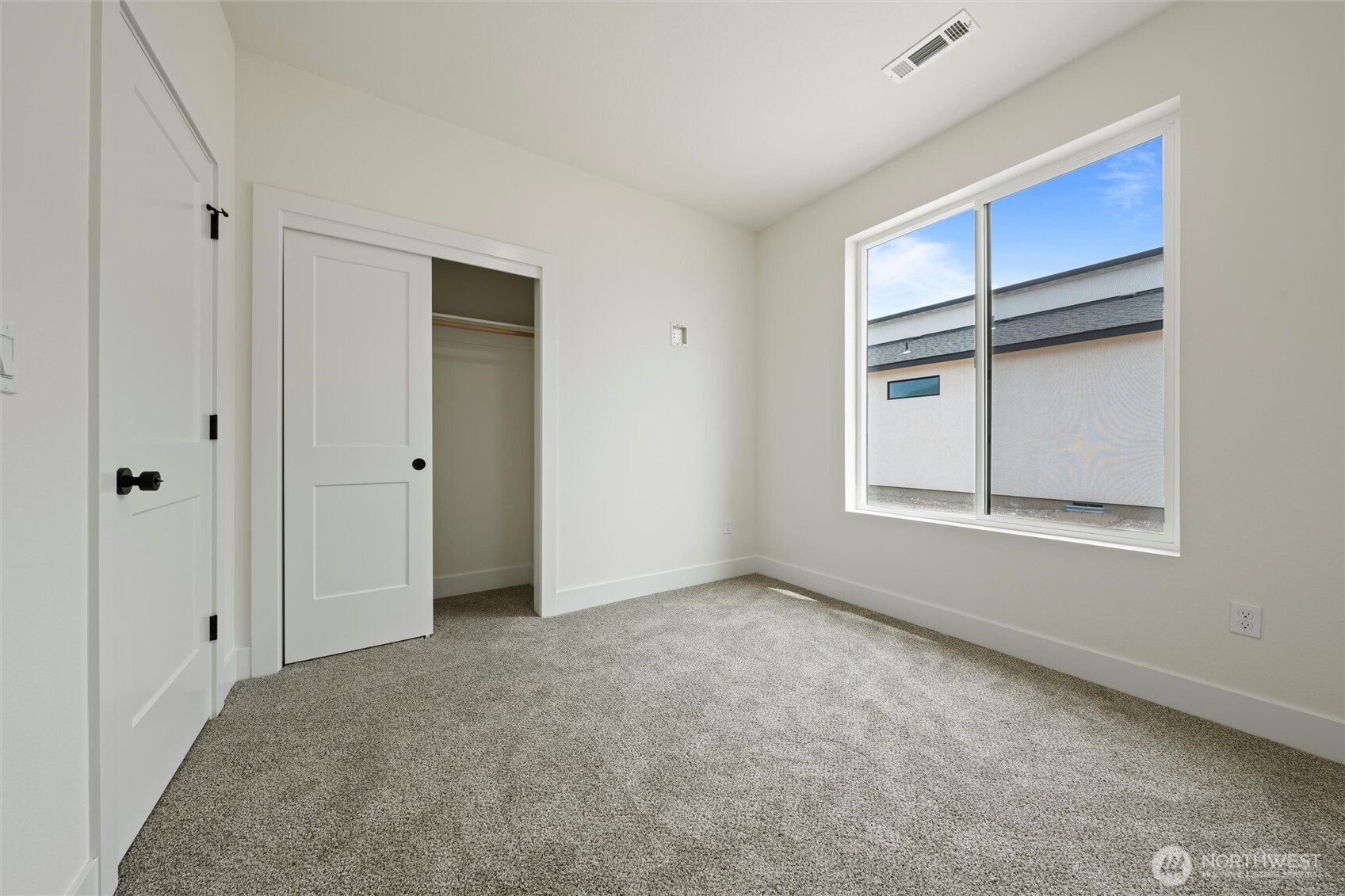 701 O Street Southwest Quincy, WA 98848 - Photo 6 of 33 a view of an empty room with a window