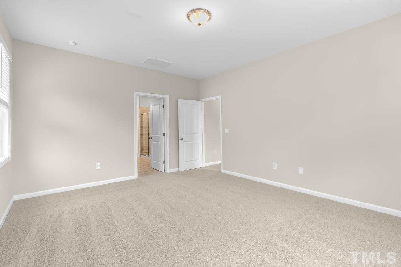 47 Madden Rose Loop Garner, NC 27529 - Photo 21 of 31 a view of an empty room