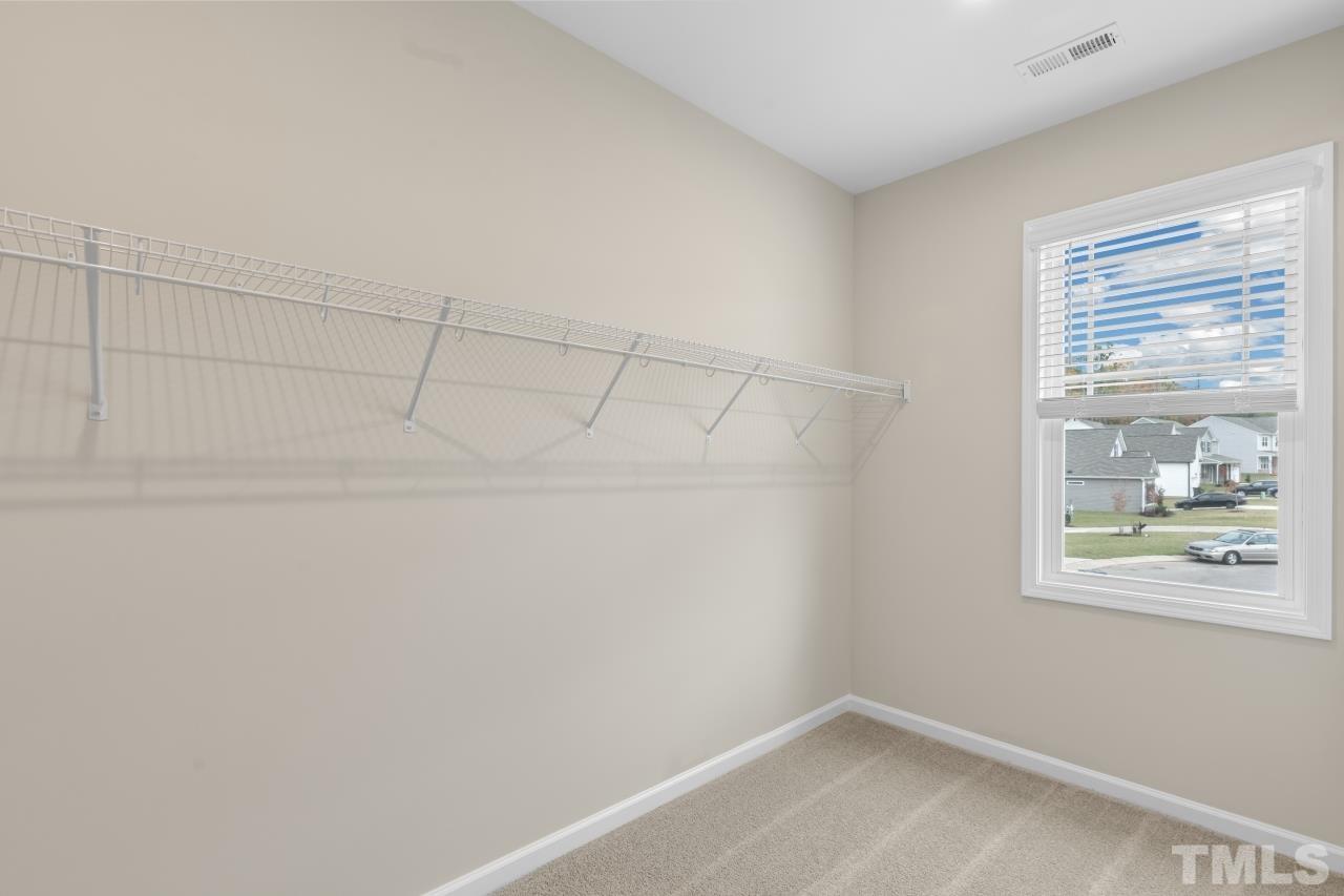 47 Madden Rose Loop Garner, NC 27529 - Photo 31 of 31 a view of a small space with racks on the wall