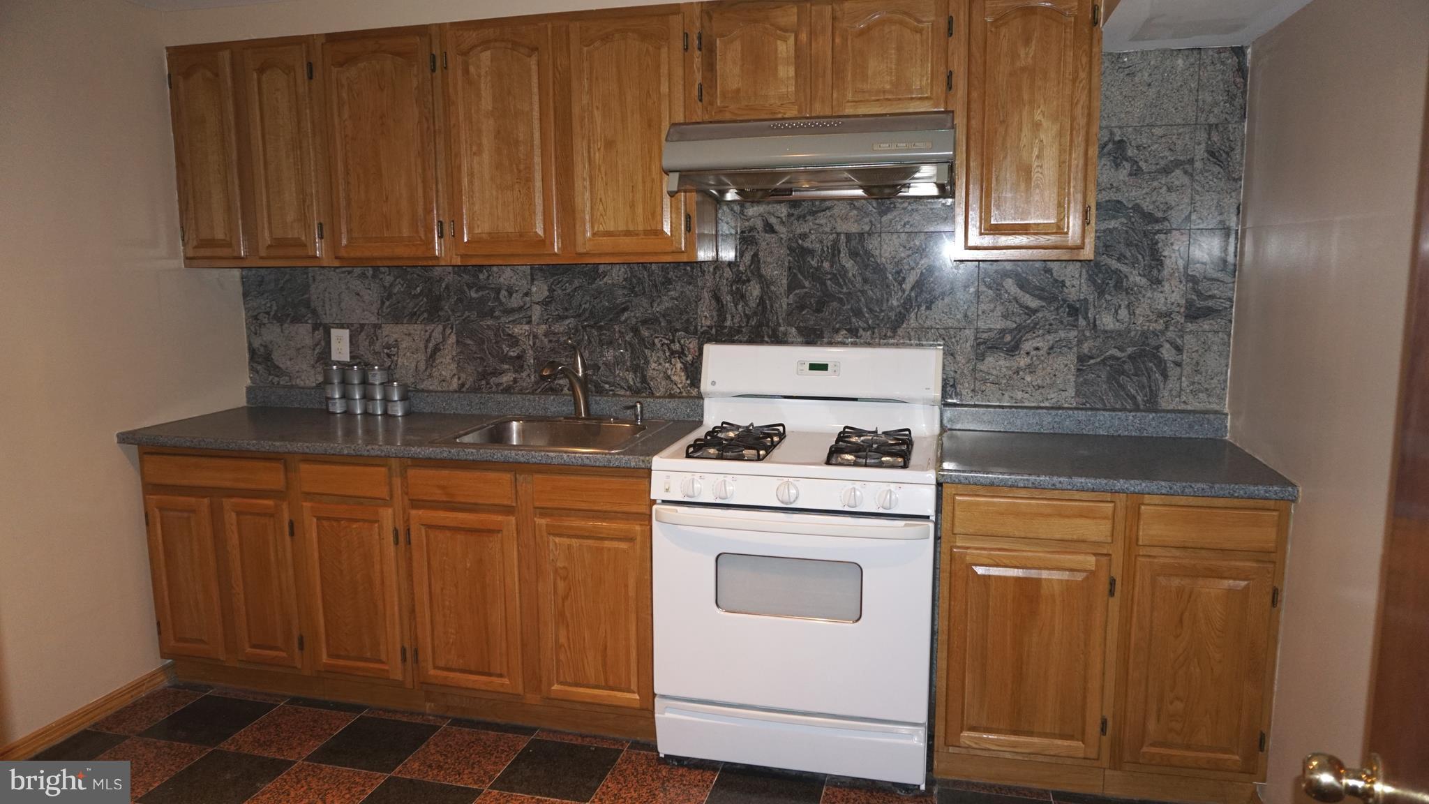 9412 Spruce Tree Circle Bethesda, MD 20814 - Photo 26 of 29 Basement kitchen.