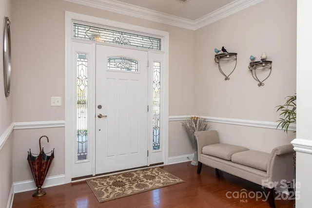 a kitchen with cabinets and stainless steel appliances