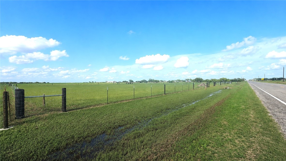 0 County Road Bishop, TX 78343 - Photo 6 of 7 a view of a lake with a big yard