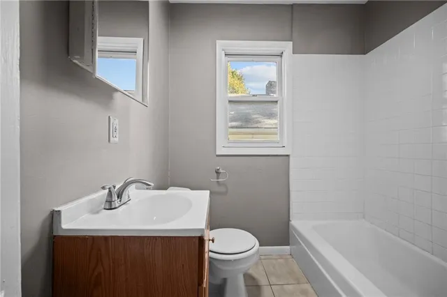 a bathroom with a sink toilet and bathtub