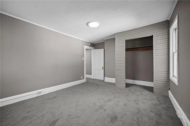 an empty room with closet