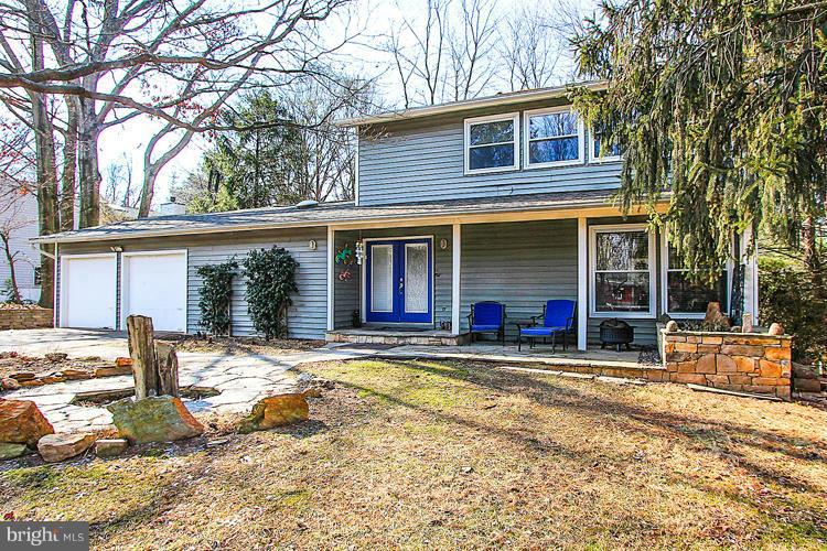 2104 Thomas View Road Reston, VA 20191 - Photo 1 of 29 a front view of a house with a yard and seating area