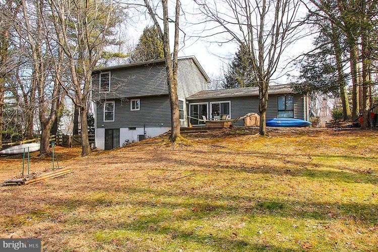 2104 Thomas View Road Reston, VA 20191 - Photo 3 of 29 a view of a house with a snow in the yard