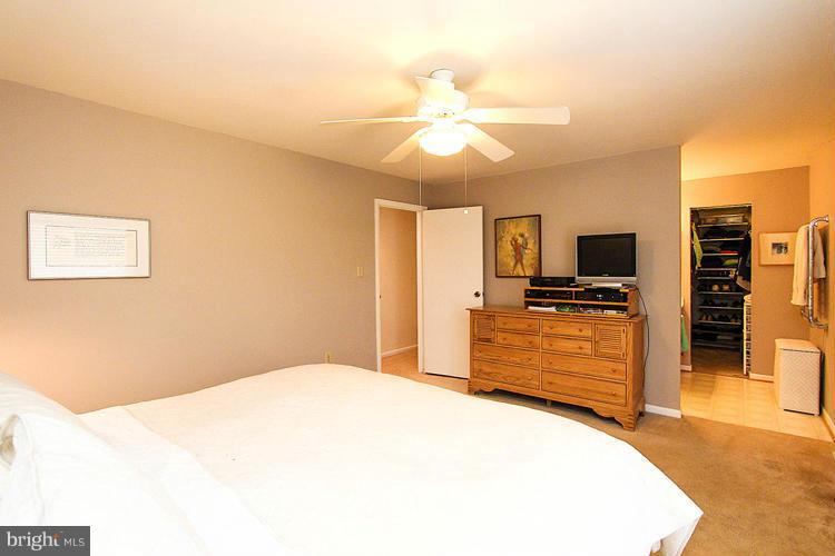 2104 Thomas View Road Reston, VA 20191 - Photo 22 of 29 a bedroom with a bed and a television