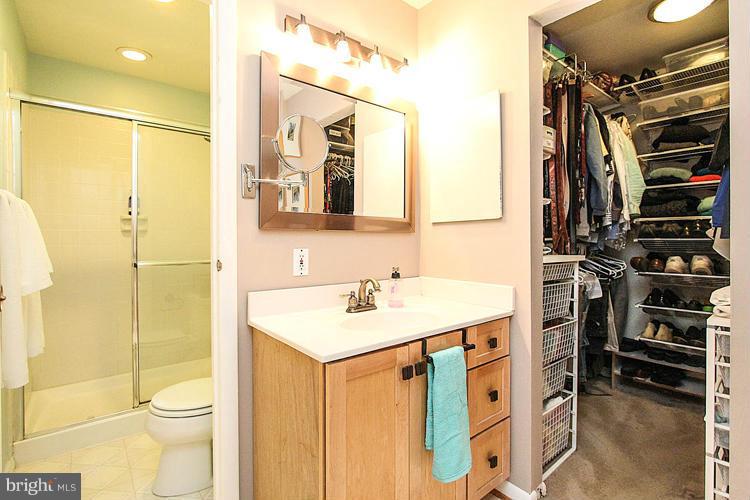2104 Thomas View Road Reston, VA 20191 - Photo 23 of 29 a bathroom with a sink a toilet and shower