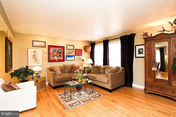 2104 Thomas View Road Reston, VA 20191 - Photo 6 of 29 a living room with furniture and a flat screen tv