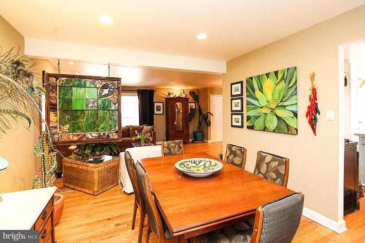2104 Thomas View Road Reston, VA 20191 - Photo 8 of 29 a dining room with furniture and a large window