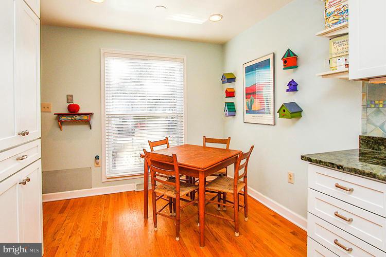 2104 Thomas View Road Reston, VA 20191 - Photo 9 of 29 a view of a dining room with furniture and wooden floor