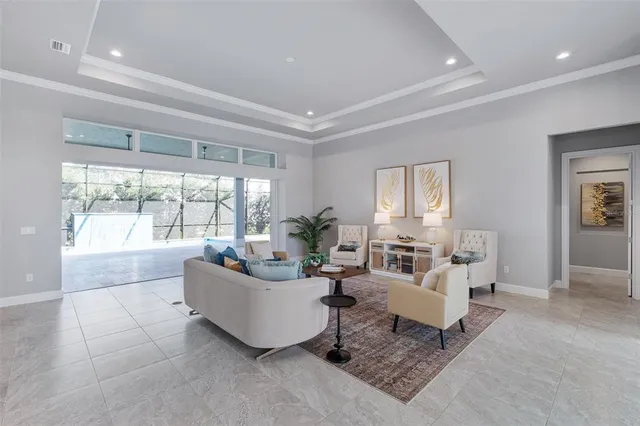 a living room with furniture and a table