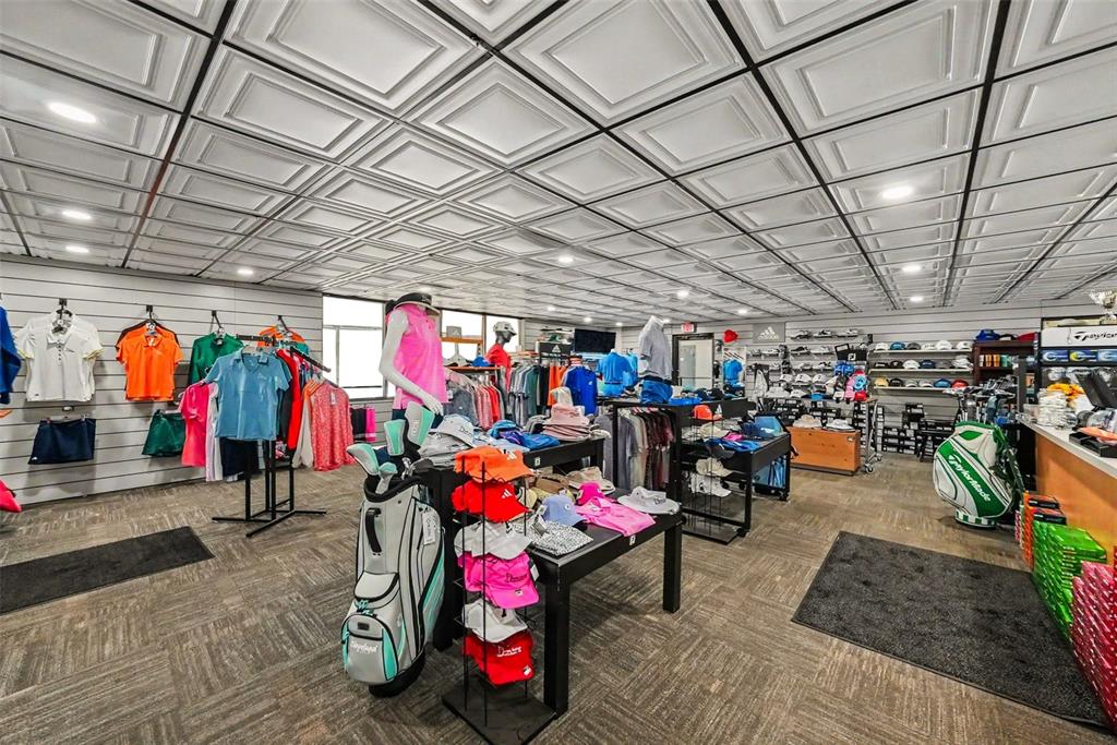 9204 Golf View Drive New Port Richey, FL 34655 - Photo 29 of 33 a group of people sitting in a room with storage