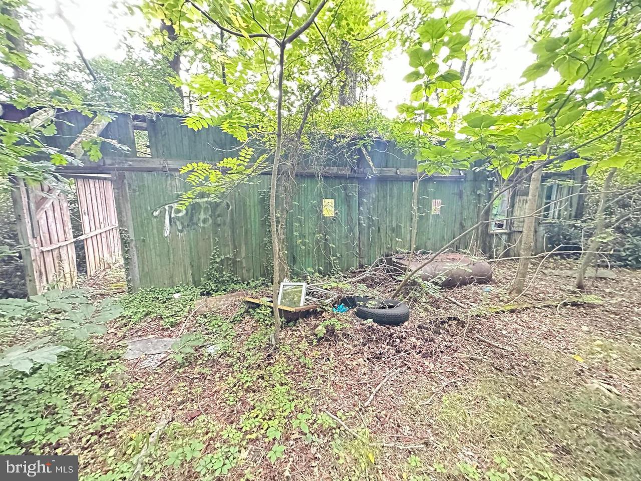 337 Ewan Road Mullica Hill, NJ 08062 - Photo 14 of 23 a backyard of a house with outdoor seating