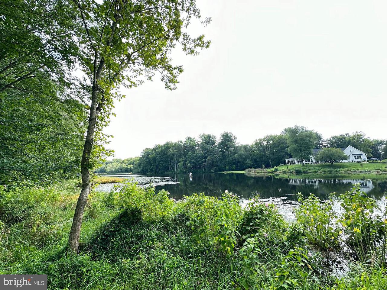 337 Ewan Road Mullica Hill, NJ 08062 - Photo 10 of 23 a view of a lake with a city