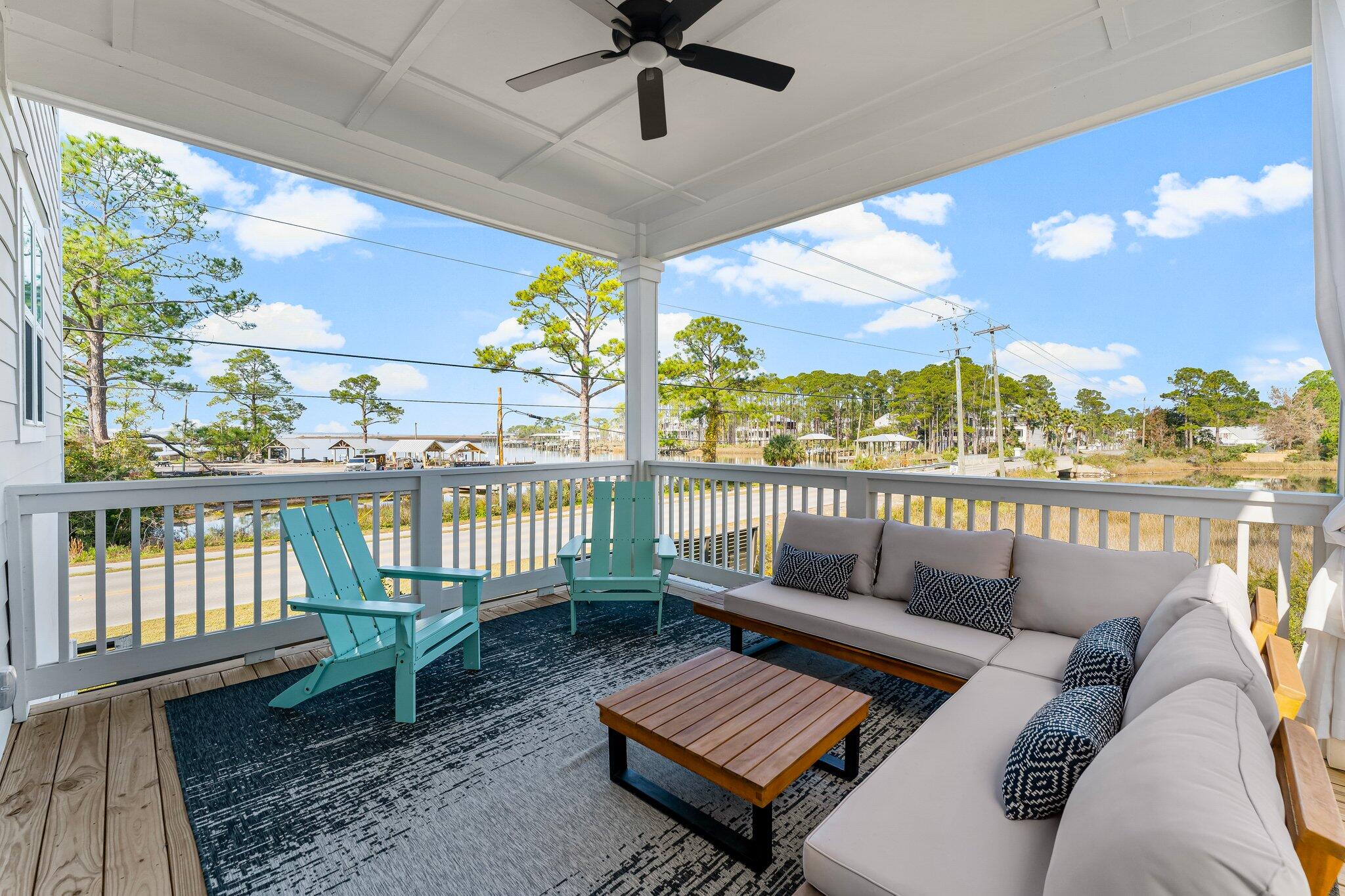 11 Tyler James Way Santa Rosa Beach, FL 32459 - Photo 26 of 56 a balcony with furniture and a floor to ceiling window