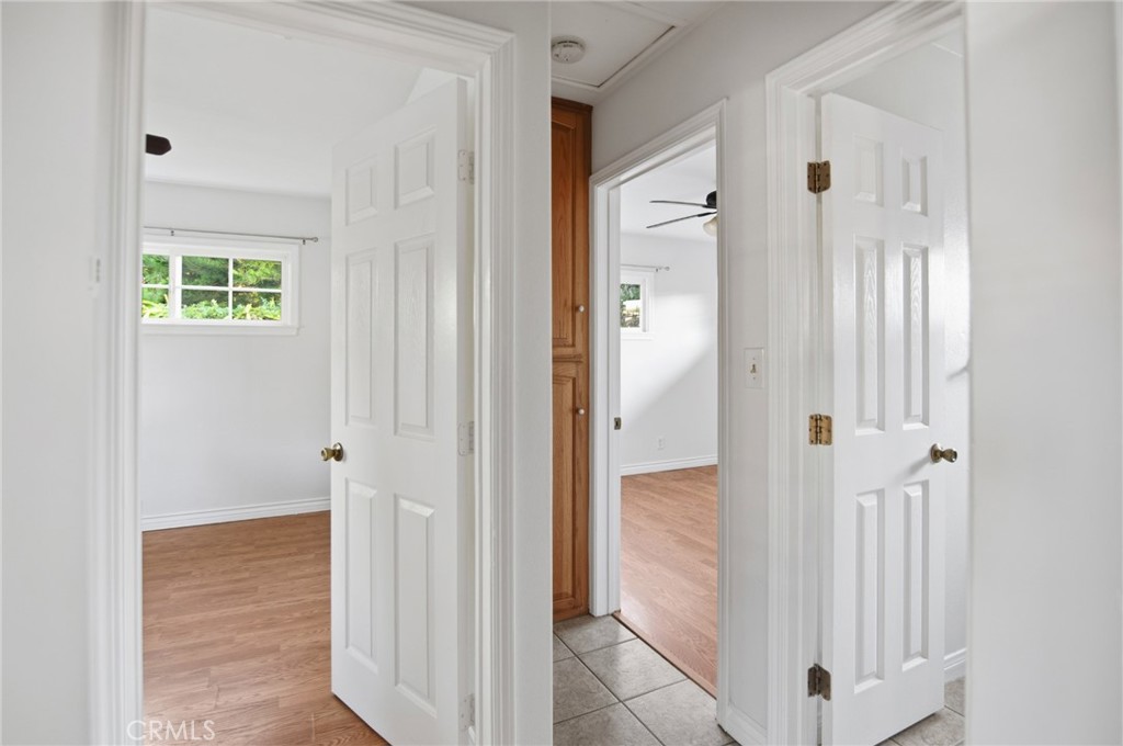 11296 Lampson Avenue Garden Grove, CA 92840 - Photo 12 of 18 a view of a bathroom with a shower and a sink