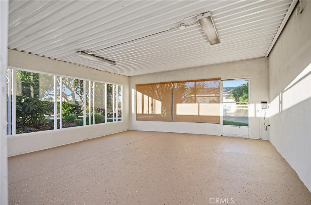 11296 Lampson Avenue Garden Grove, CA 92840 - Photo 17 of 18 a view of empty room with floor to ceiling window