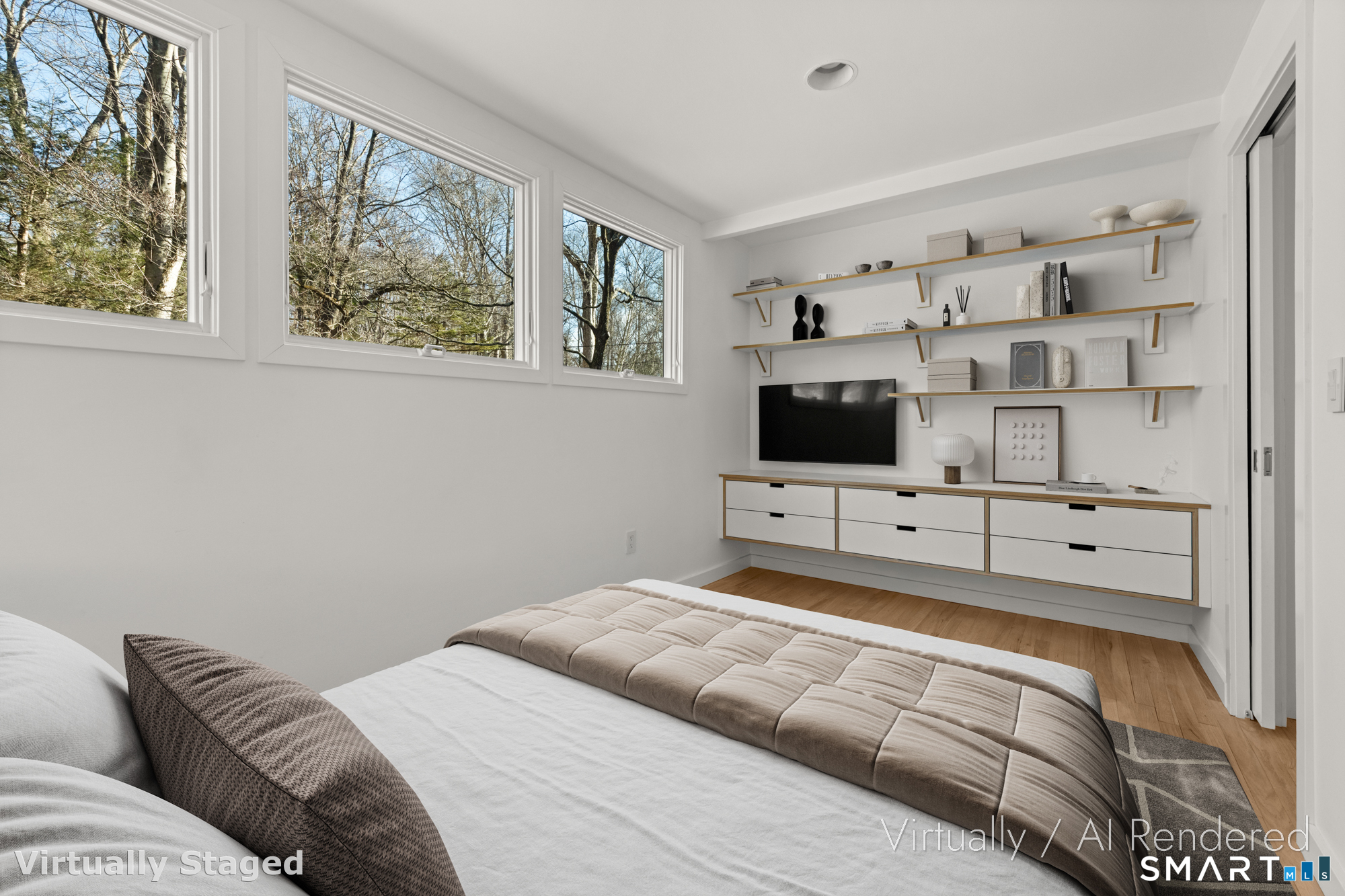 17 Richmond Hill Road Weston, CT 06883 - Photo 20 of 24 a bedroom with a bed and a flat screen tv