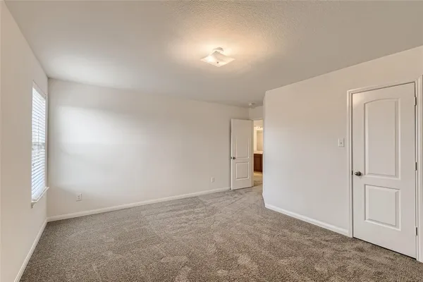an empty room with an entryway