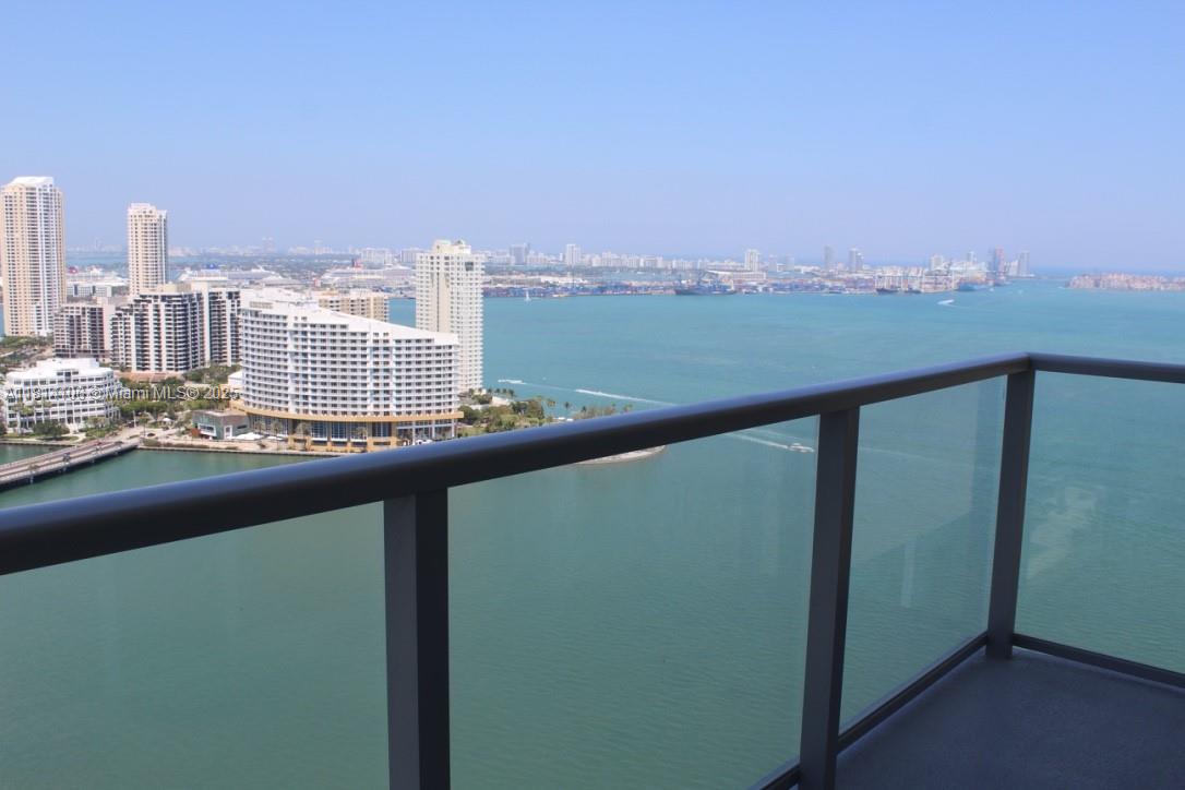 Brickell Miami, FL 33131 - Photo 1 of 25 a view of a city skyline from a balcony