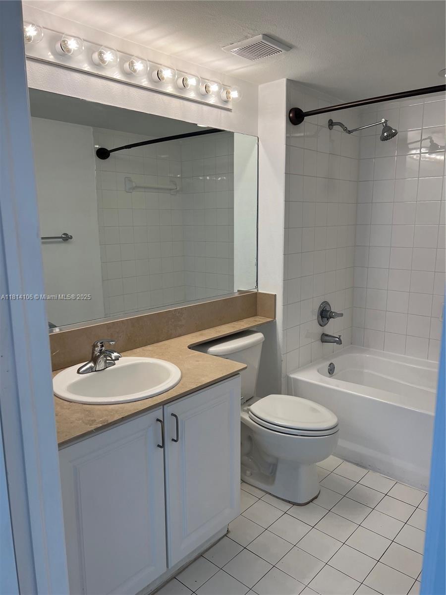 Brickell Miami, FL 33131 - Photo 11 of 25 a bathroom with a sink toilet and shower