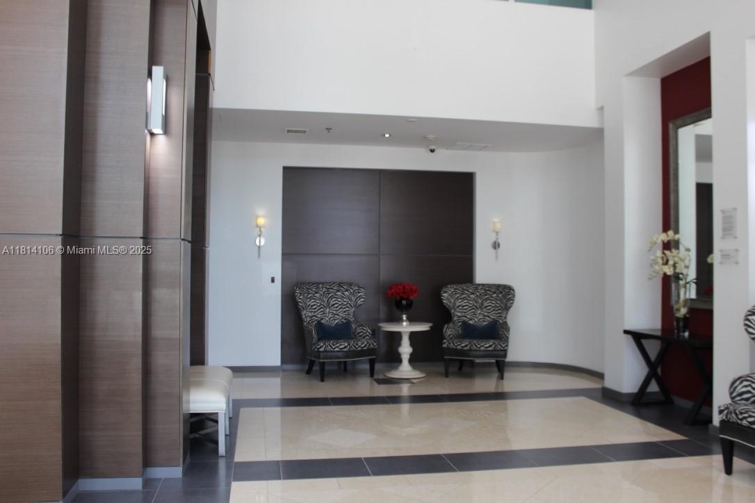 Brickell Miami, FL 33131 - Photo 22 of 25 a kitchen with a refrigerator and sink