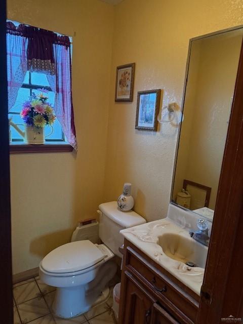 21 East Rios Cove Street Roma, TX 78584 - Photo 16 of 19 a bathroom with a sink and toilet