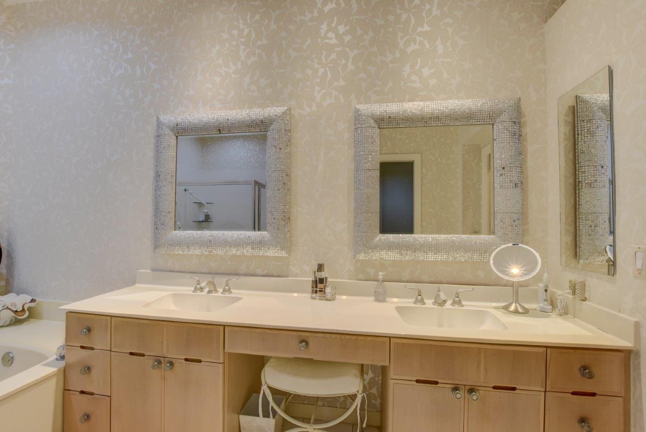 5758 Northwest 24th Terrace Boca Raton, FL 33496 - Photo 23 of 35 a bathroom with a double vanity sink mirror and