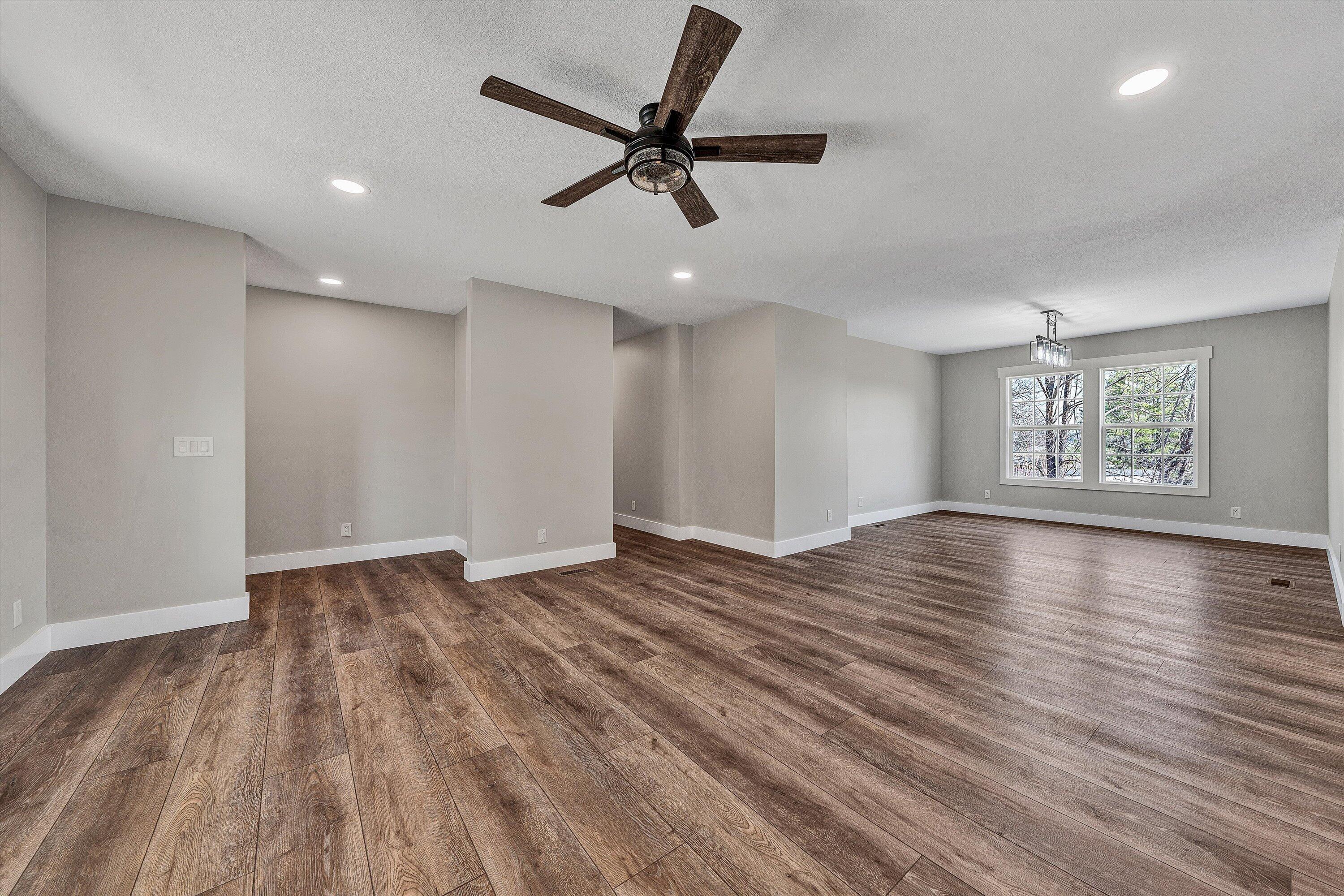 200 Surber Drive Moneta, VA 24121 - Photo 11 of 52 a view of empty room with wooden floor and fan