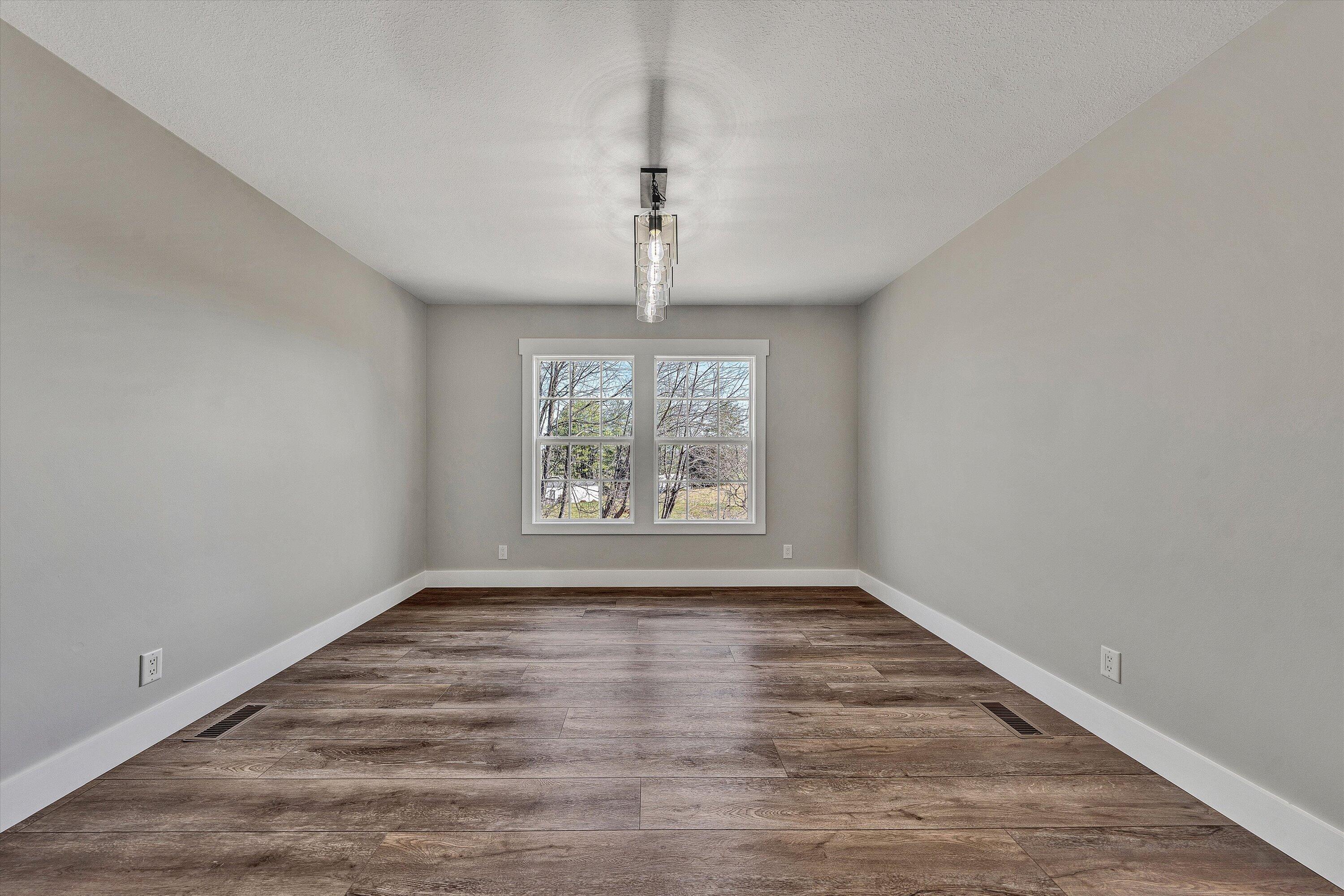 200 Surber Drive Moneta, VA 24121 - Photo 13 of 52 wooden floor in an empty room with a window
