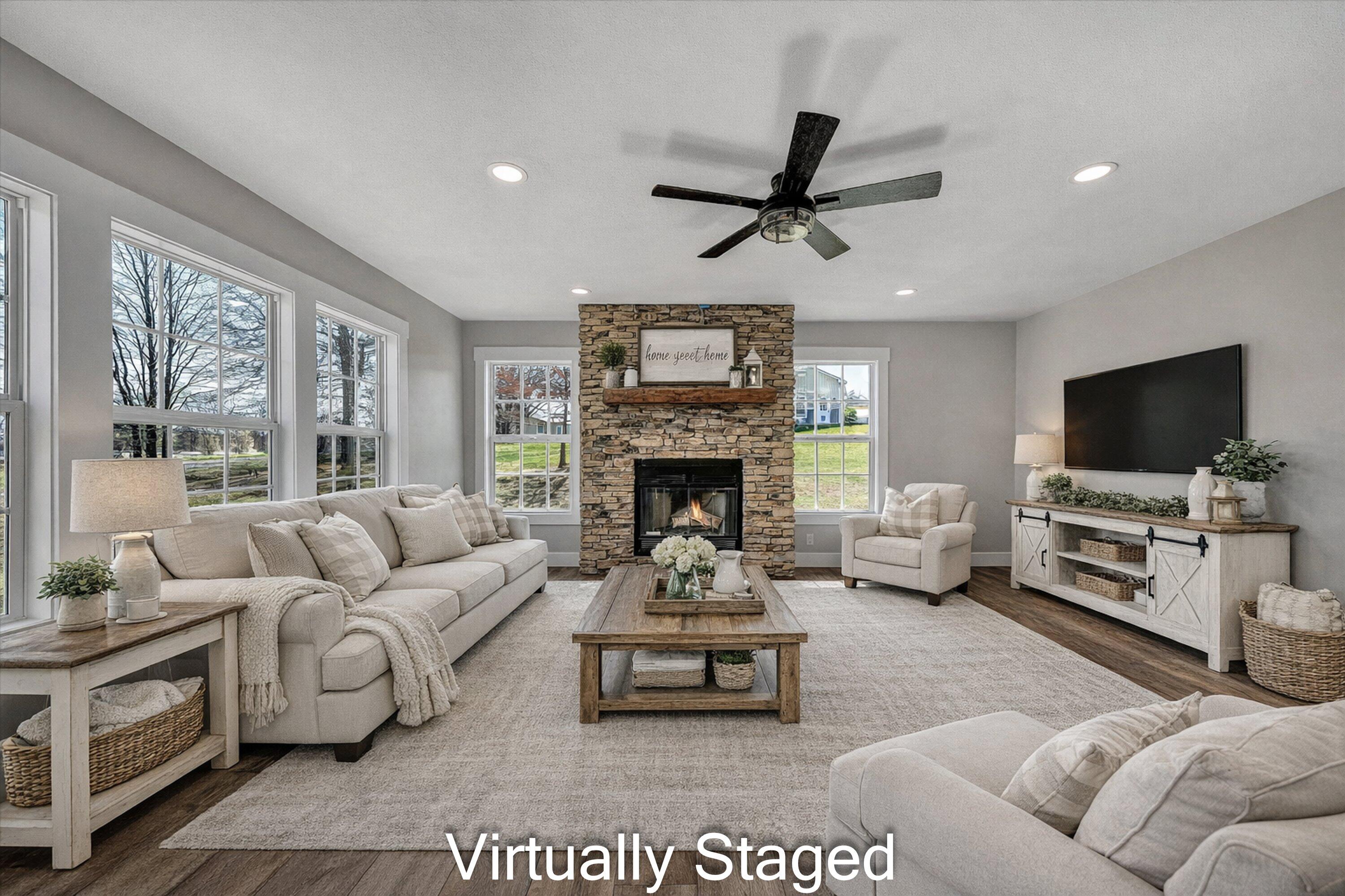 200 Surber Drive Moneta, VA 24121 - Photo 19 of 52 a living room with furniture and a flat screen tv