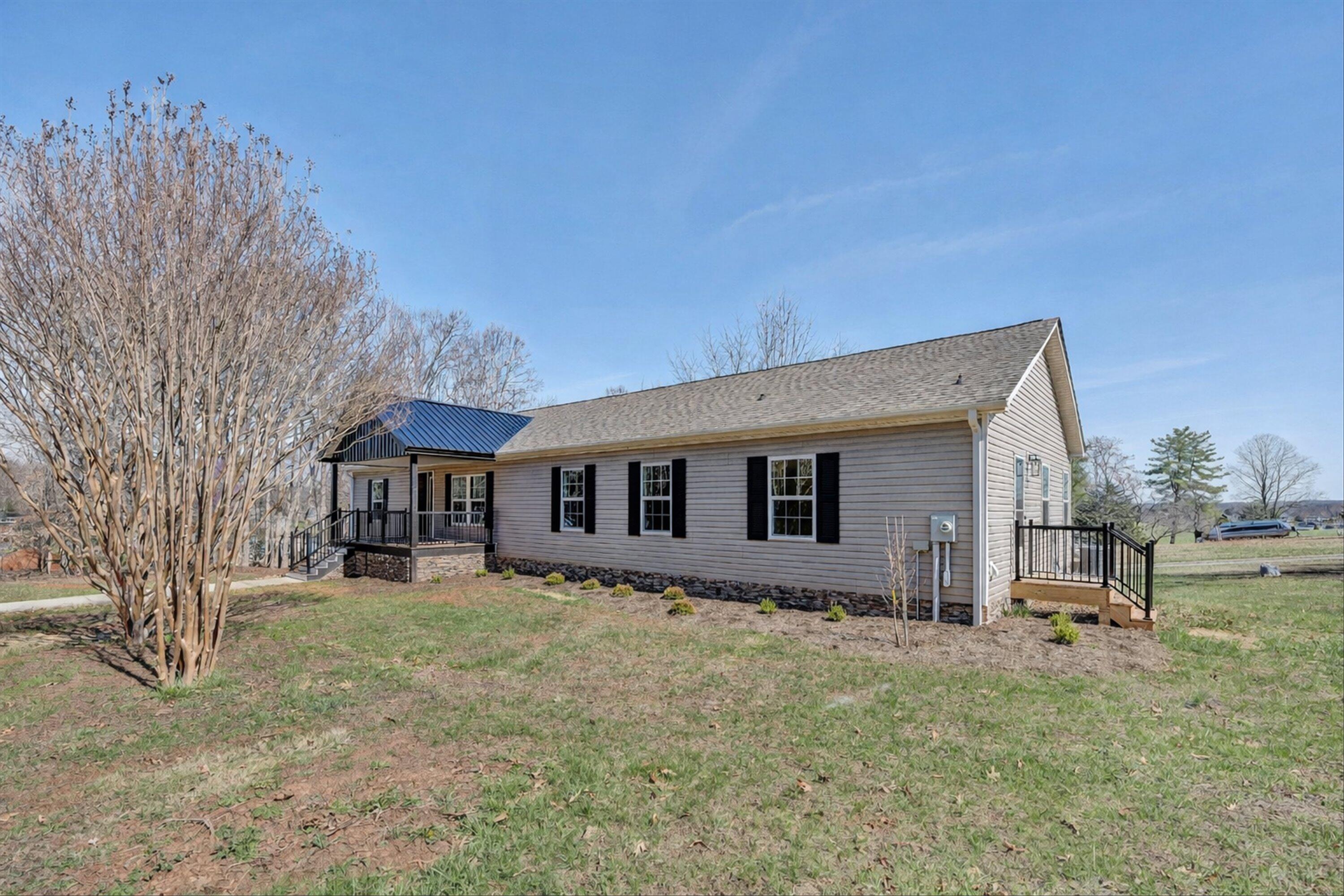 200 Surber Drive Moneta, VA 24121 - Photo 2 of 52 a house view with a outdoor space