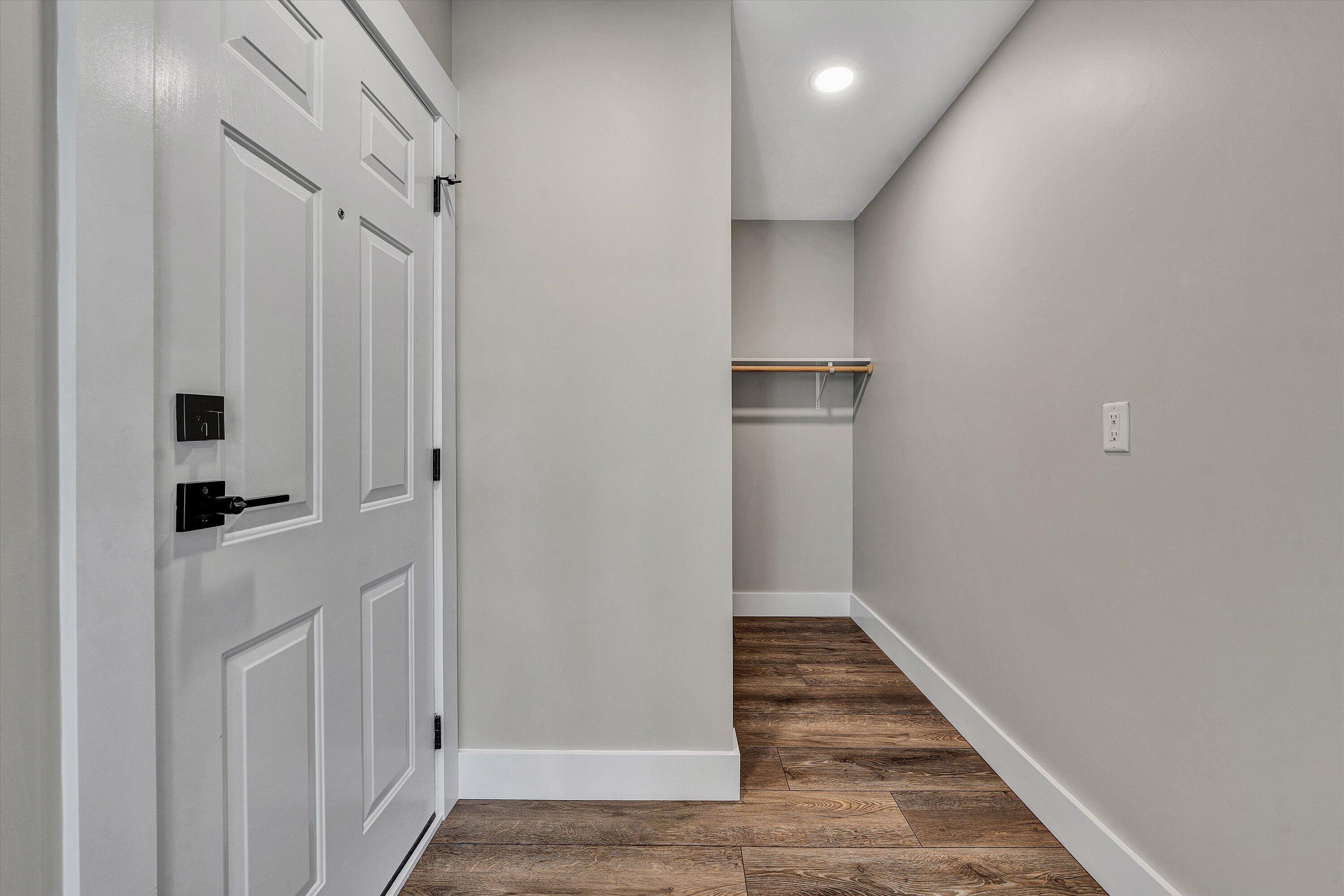 200 Surber Drive Moneta, VA 24121 - Photo 24 of 52 a view of a hallway with wooden floor and staircase