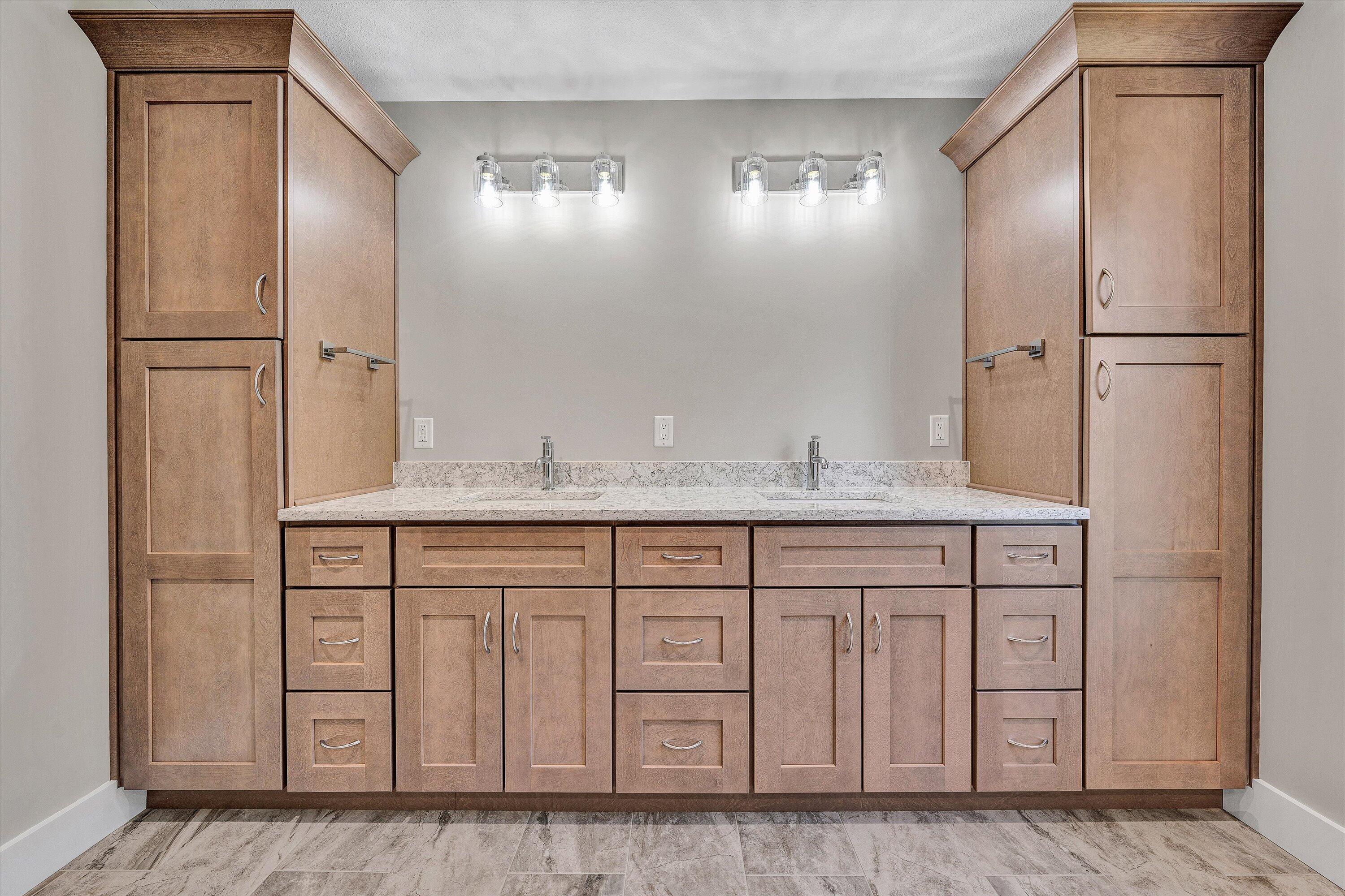 200 Surber Drive Moneta, VA 24121 - Photo 27 of 52 a bathroom with a granite countertop sink and a mirror