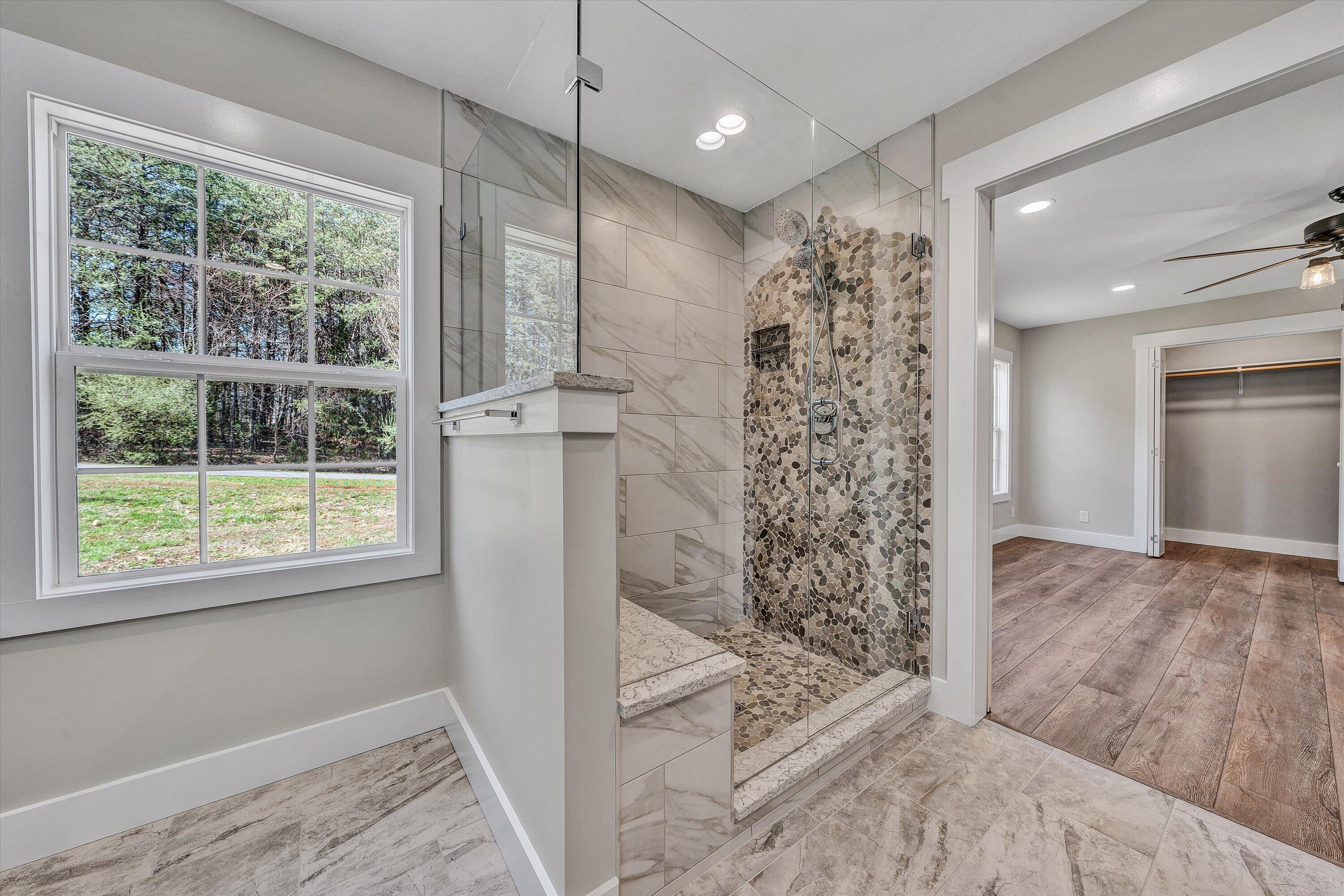 200 Surber Drive Moneta, VA 24121 - Photo 28 of 52 a view of a bathroom with a shower and a sink