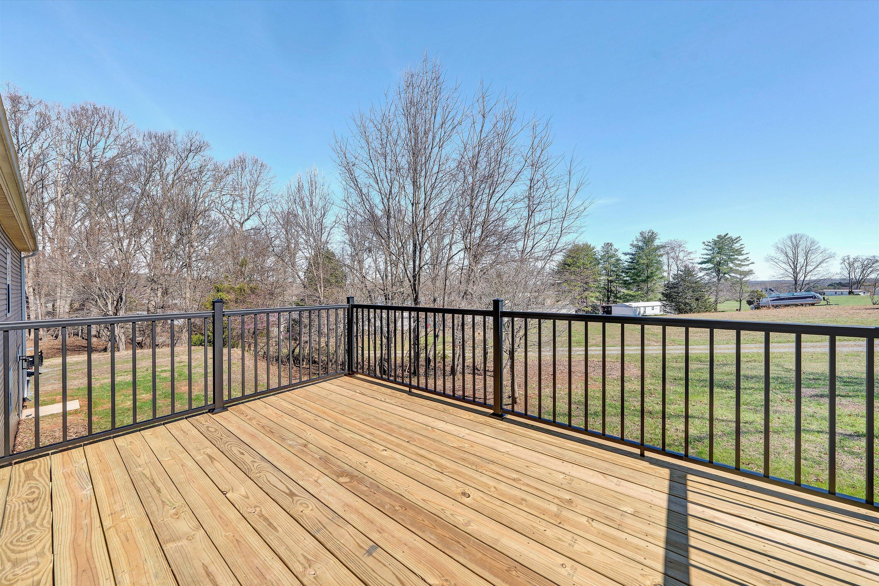 200 Surber Drive Moneta, VA 24121 - Photo 30 of 52 a view of balcony with wooden floor and fence