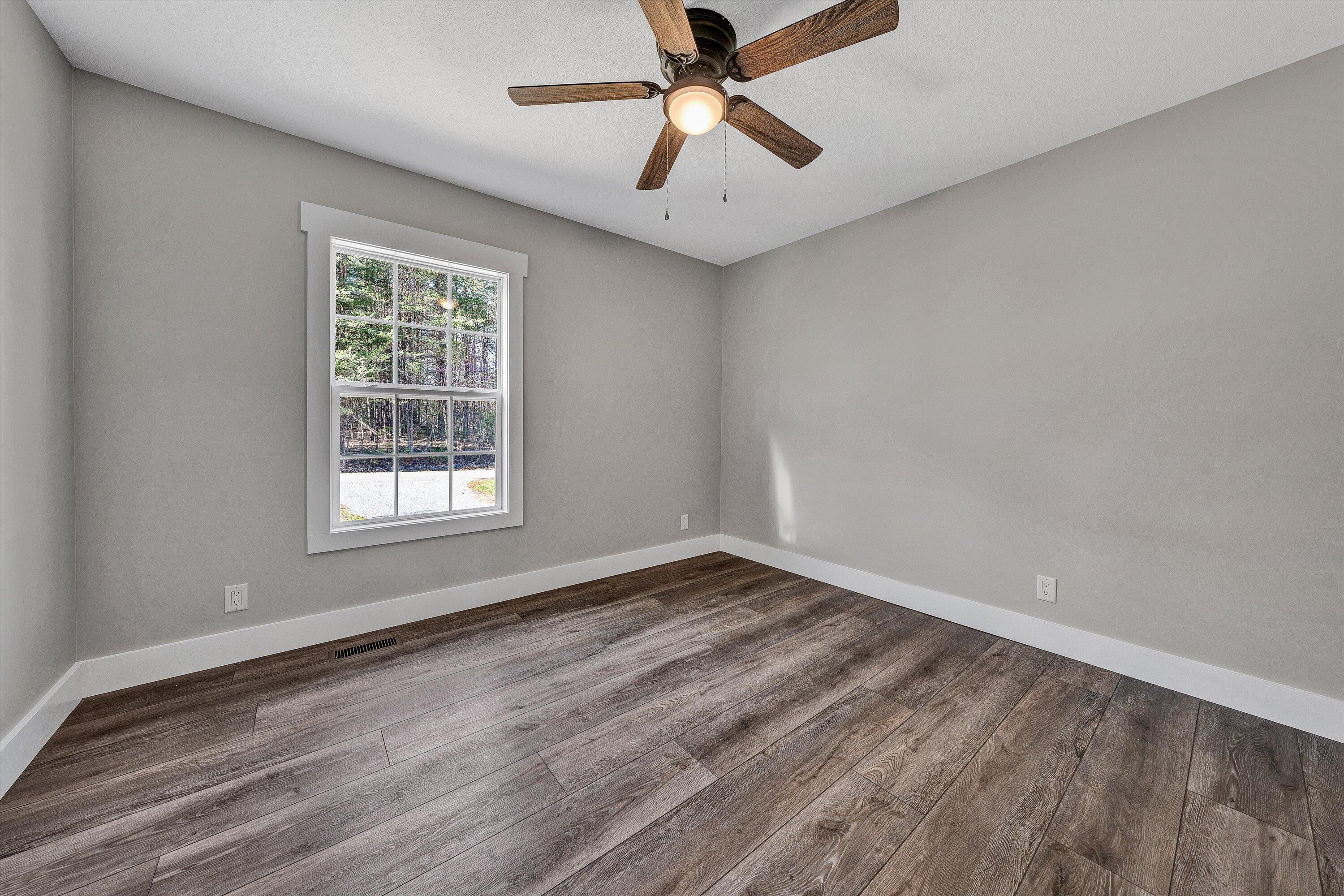 200 Surber Drive Moneta, VA 24121 - Photo 33 of 52 wooden floor in an empty room with a window